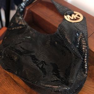Michael Kor’s Faux Snakeskin Handbag Gold accents